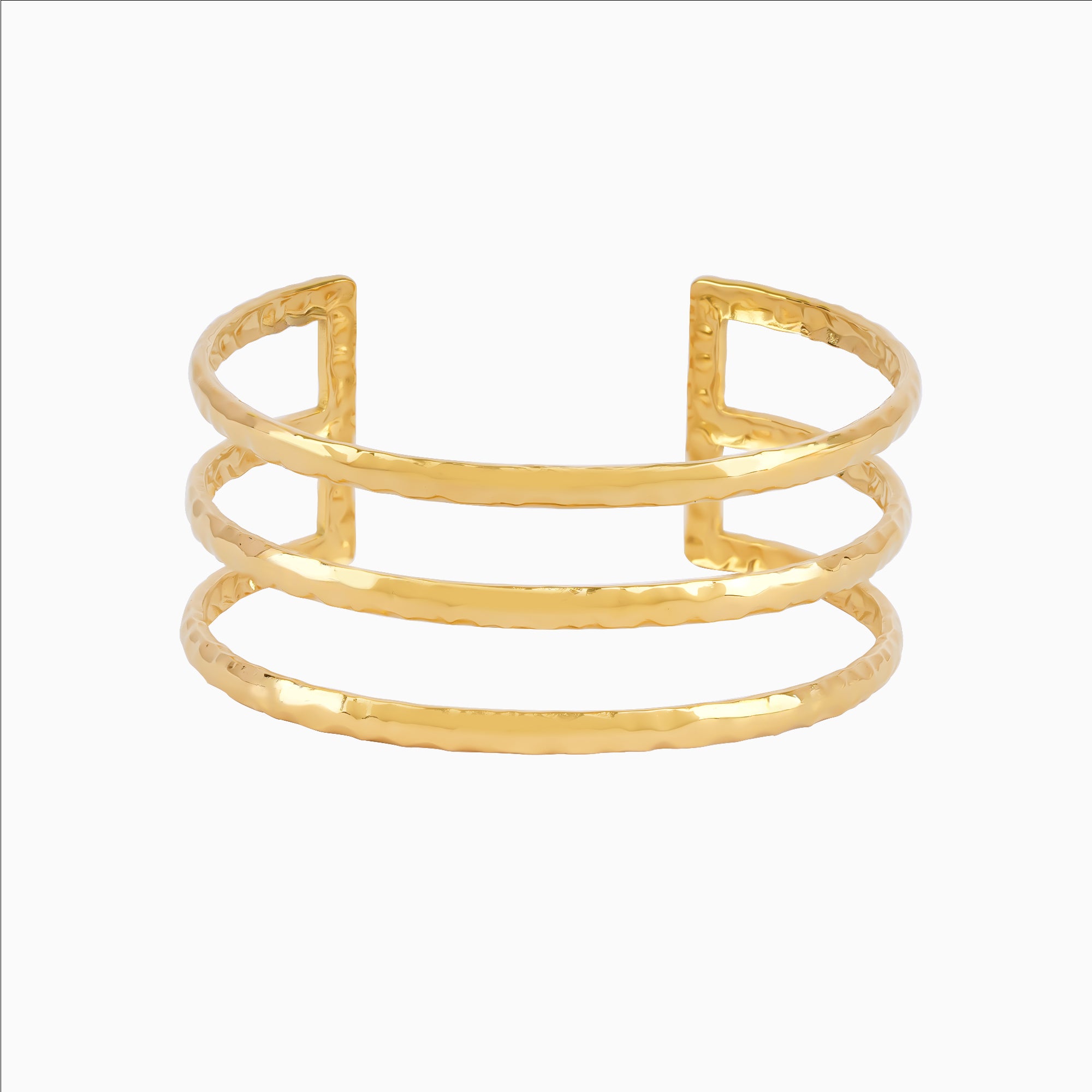 Gold bracelet on a white background