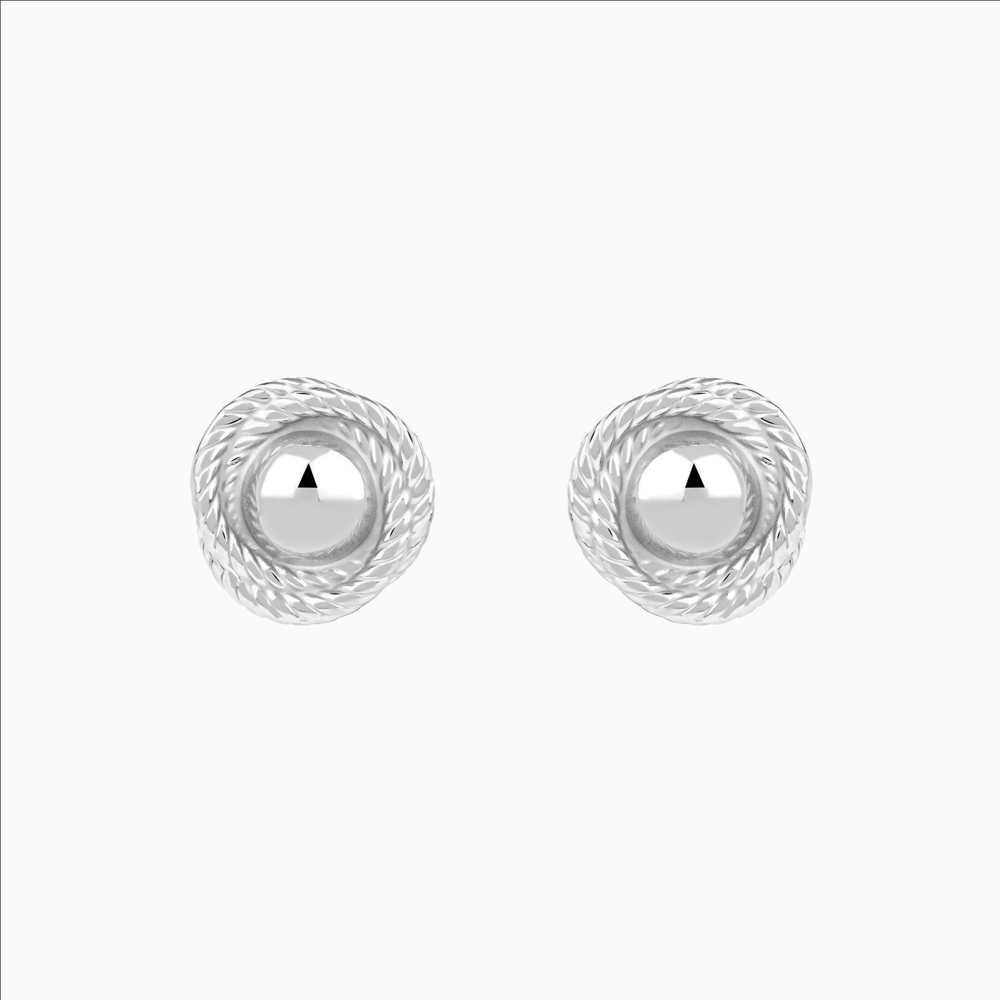 Pair of silver earrings with a white background