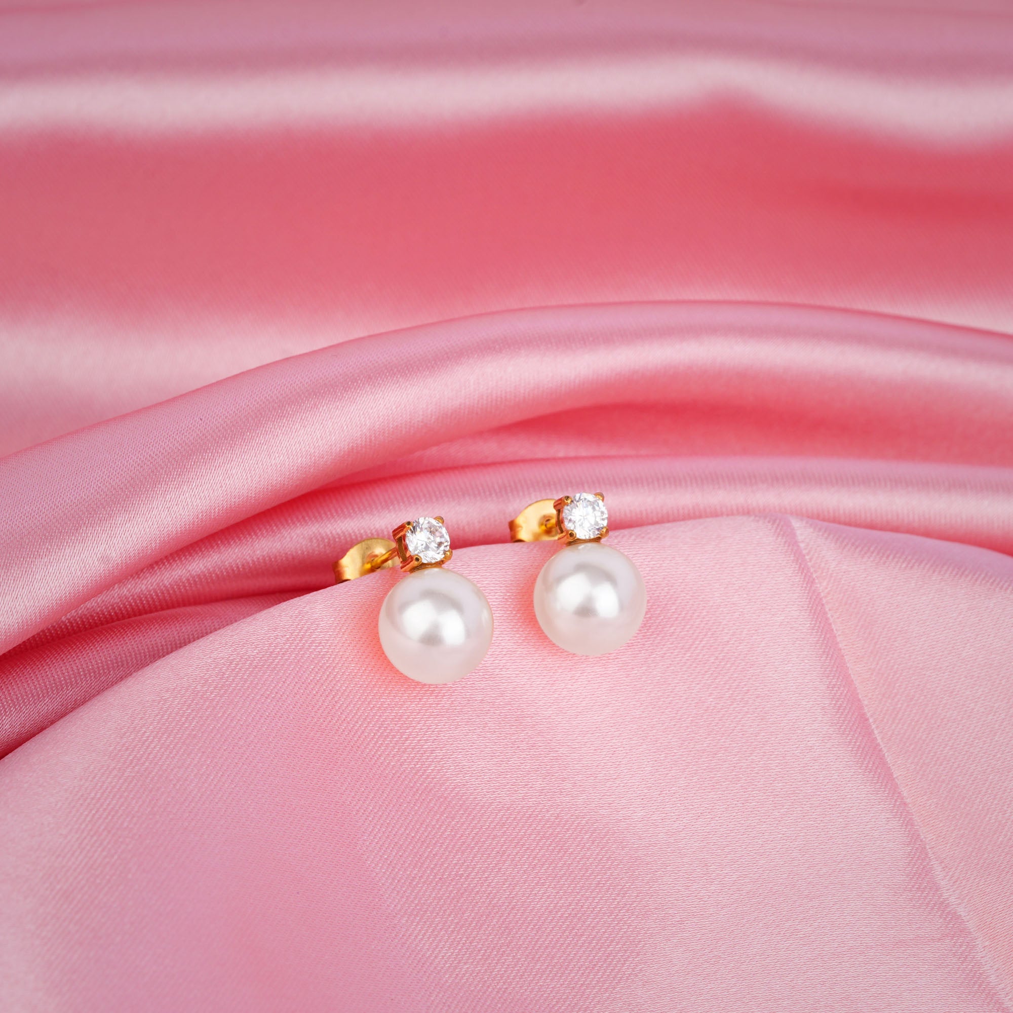 Elegant pearl drop earrings with cubic zirconia stud