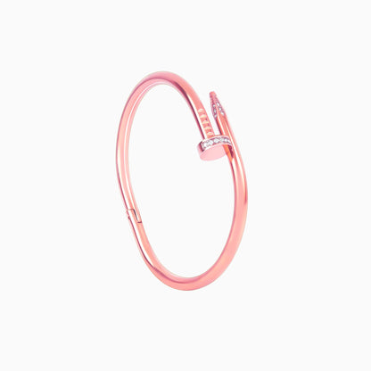 Rose gold nail bangle bracelet flatlay