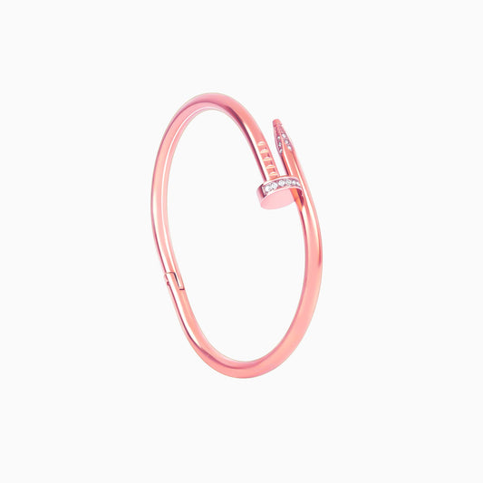 Rose gold nail bangle bracelet flatlay