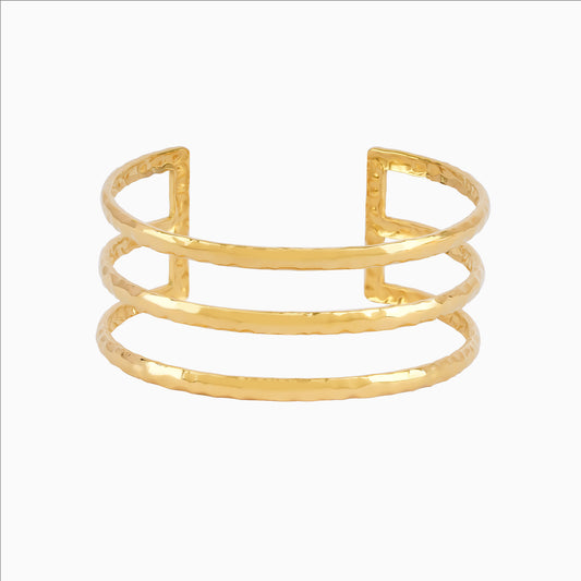 Gold bracelet on a white background