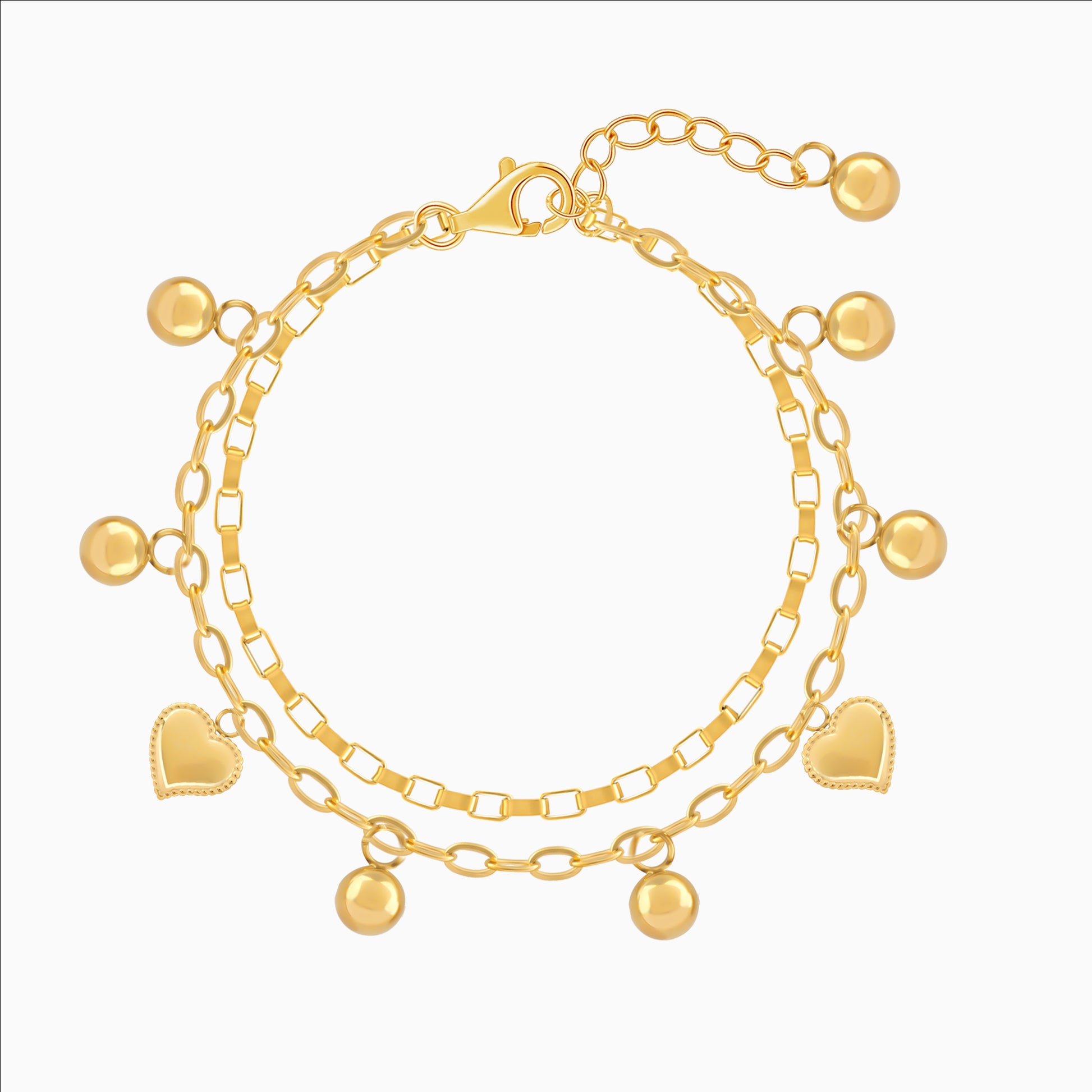 Gold bracelet with heart and round charms on a white background