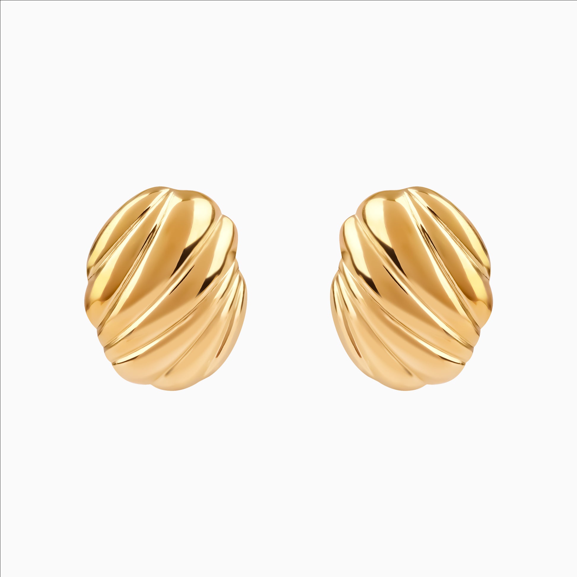Shell-shaped gold statement stud earrings