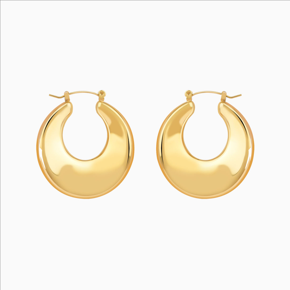Chunky U-shaped gold hoop earrings