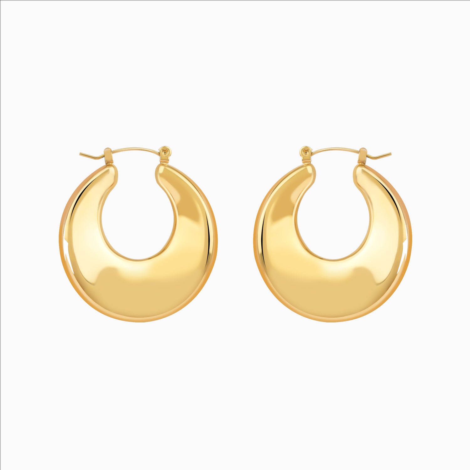 Chunky U-shaped gold hoop earrings