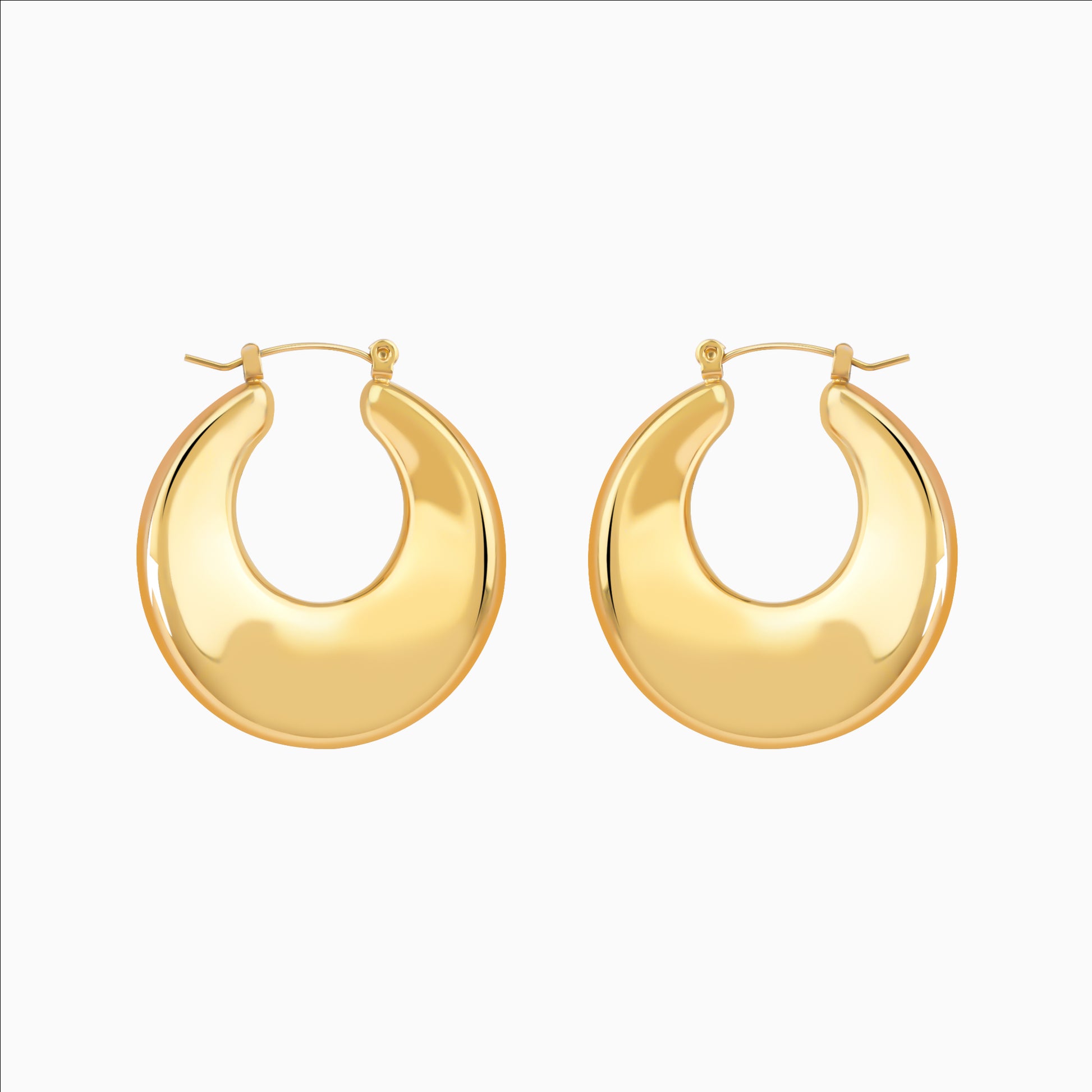 Chunky U-shaped gold hoop earrings