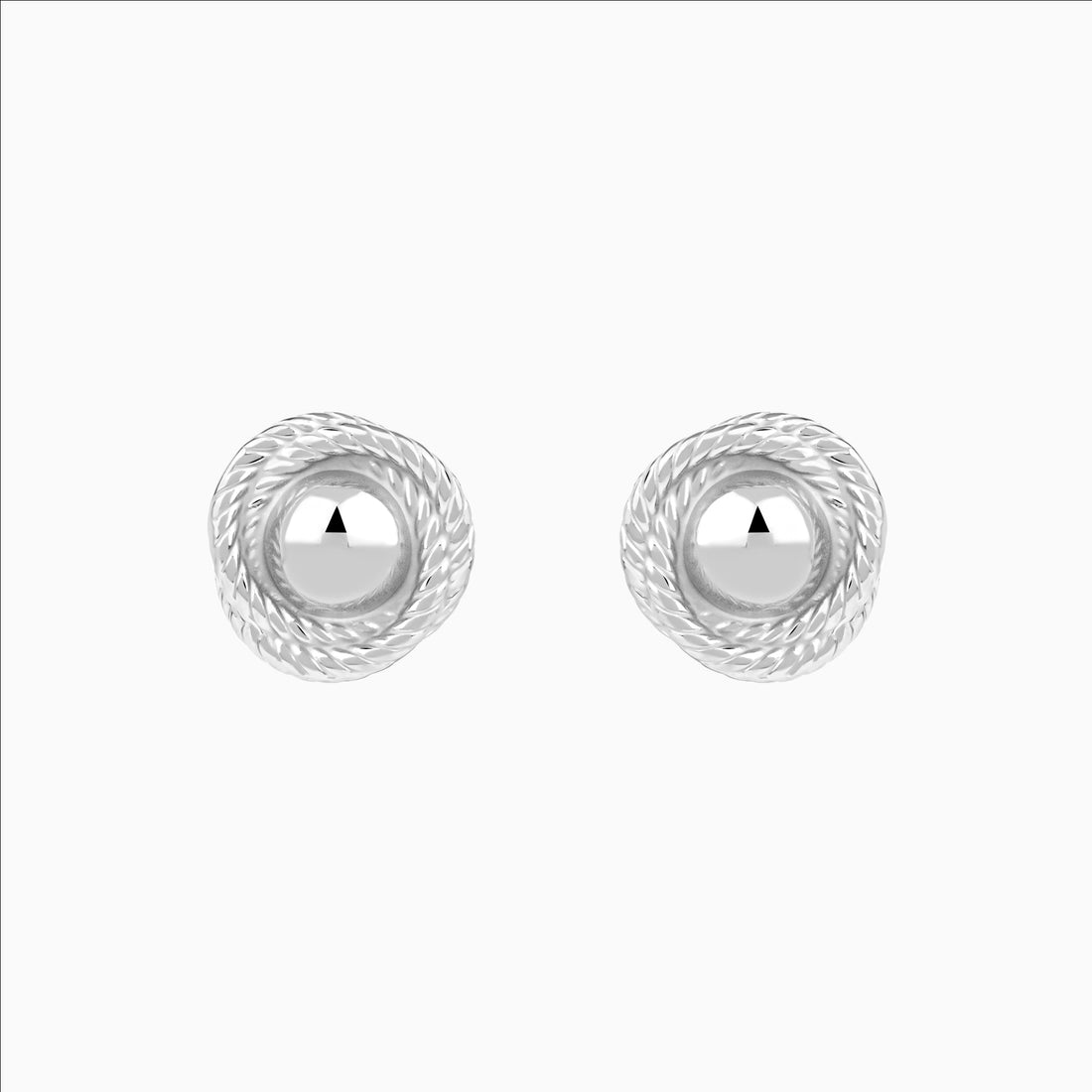Pair of silver earrings with a white background