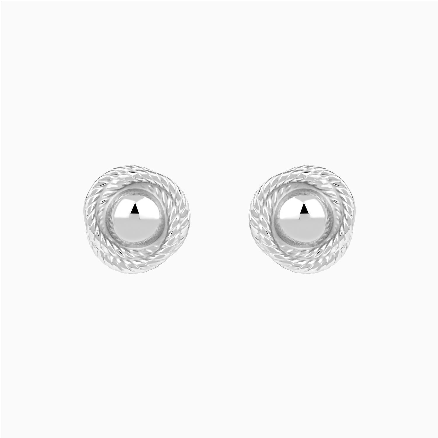 Pair of silver earrings with a white background
