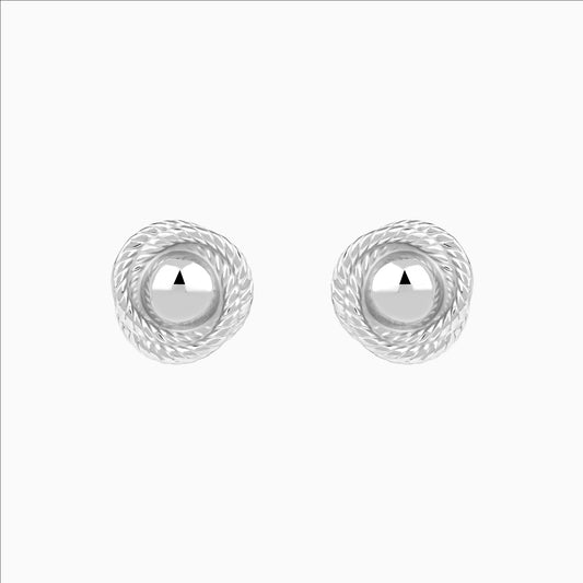 Pair of silver earrings with a white background