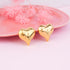 Golden Drift oversized gold heart earrings