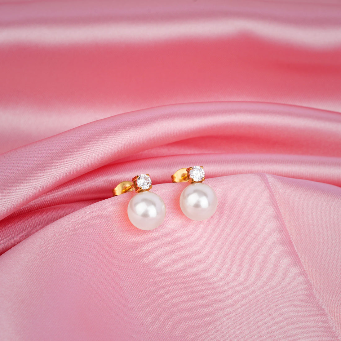 Elegant pearl drop earrings with cubic zirconia stud