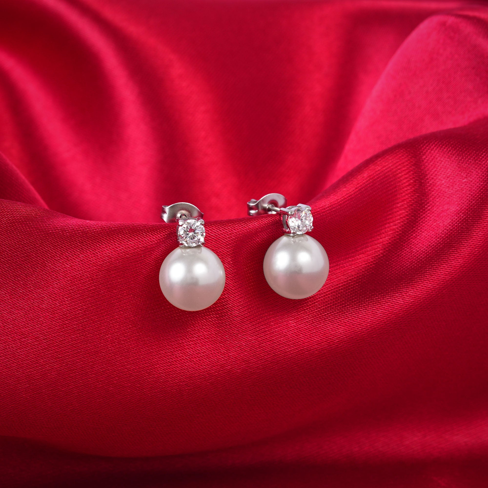 Elegant pearl drop earrings with cubic zirconia stud