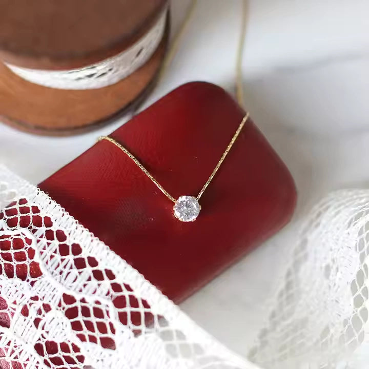 Gold link chain with round CZ pendant