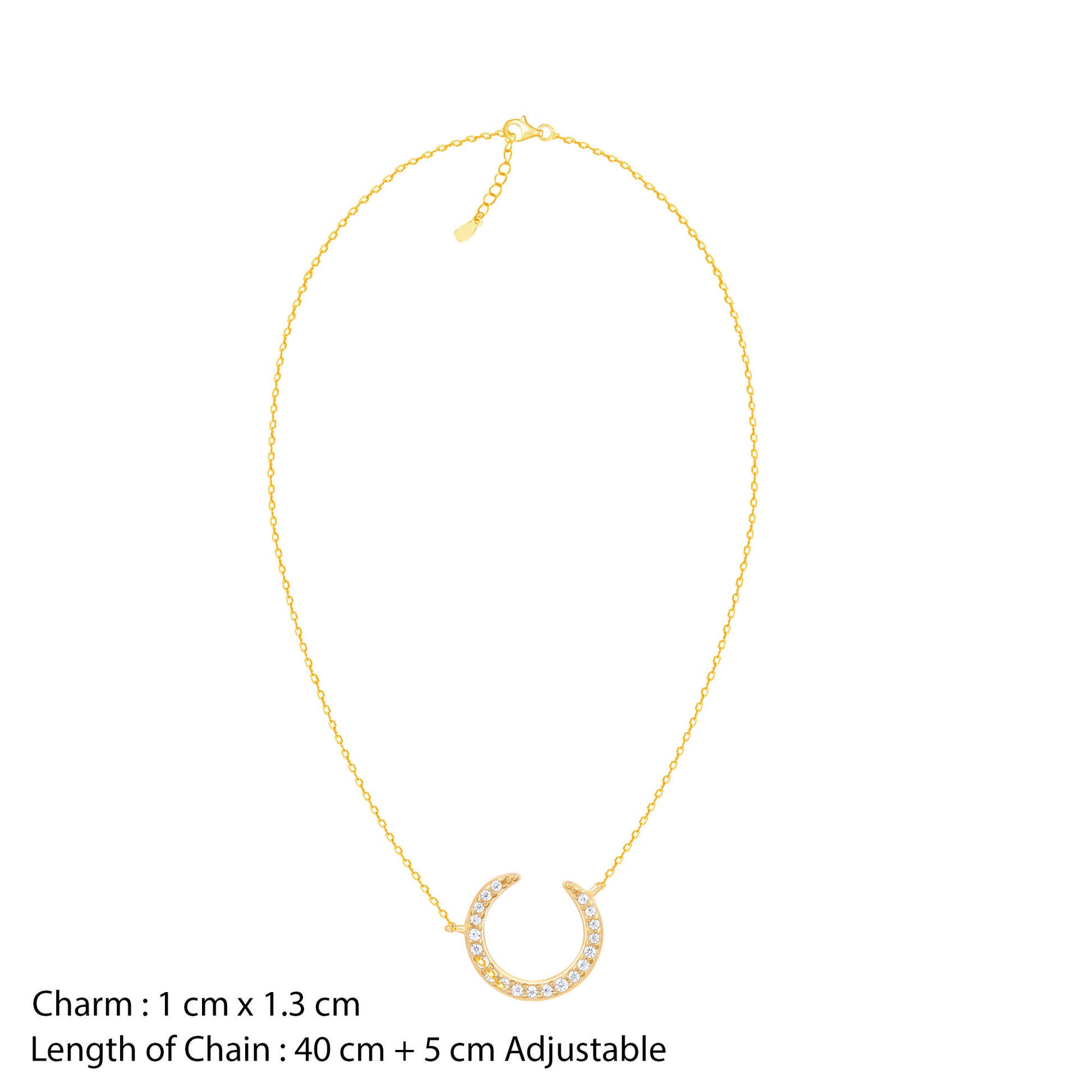 Gold necklace with a small round charm on a white background